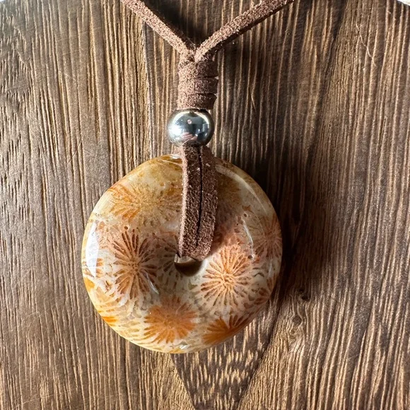Light Yellow Coral Fossil Donut Pendant Necklace on Brown Faux Suede - Picture 5 of 11